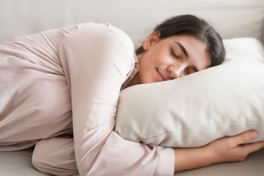 women getting good sleep to help against PCOS