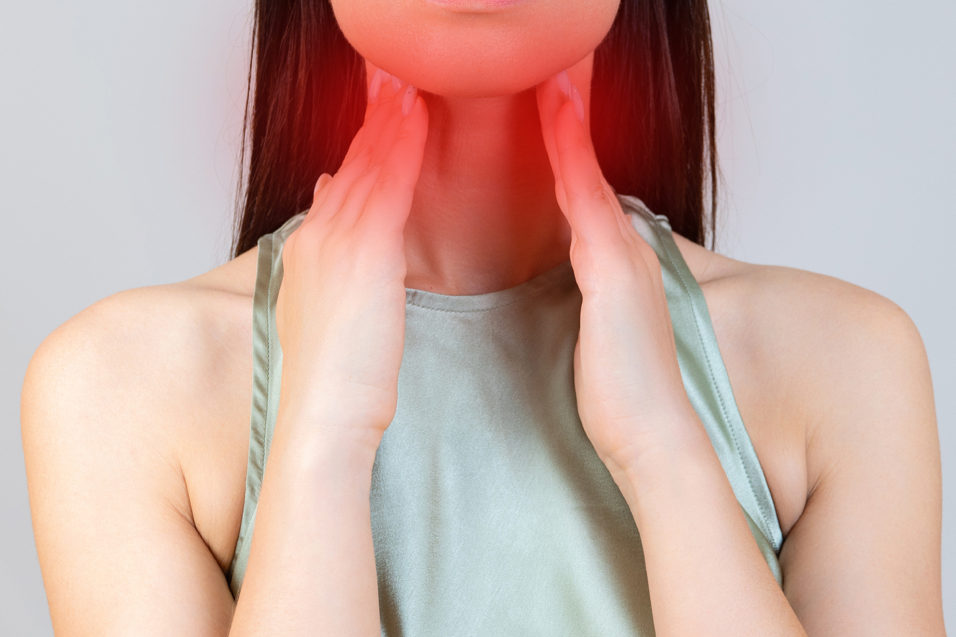 A woman with sore throat